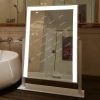 vanity mirror with lights around it