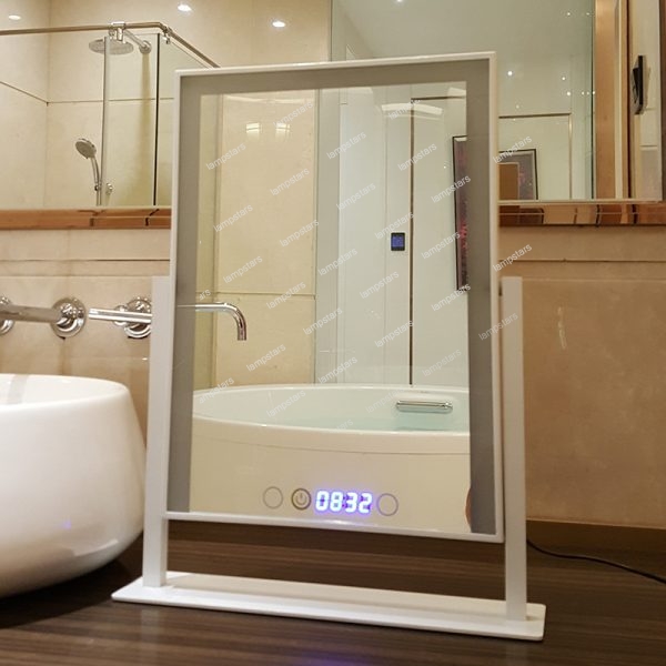 white vanity with lighted mirror